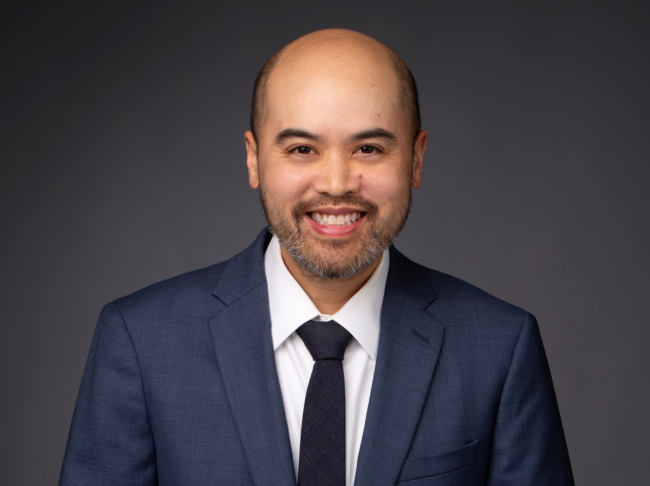 Business headshot of attorney at studio