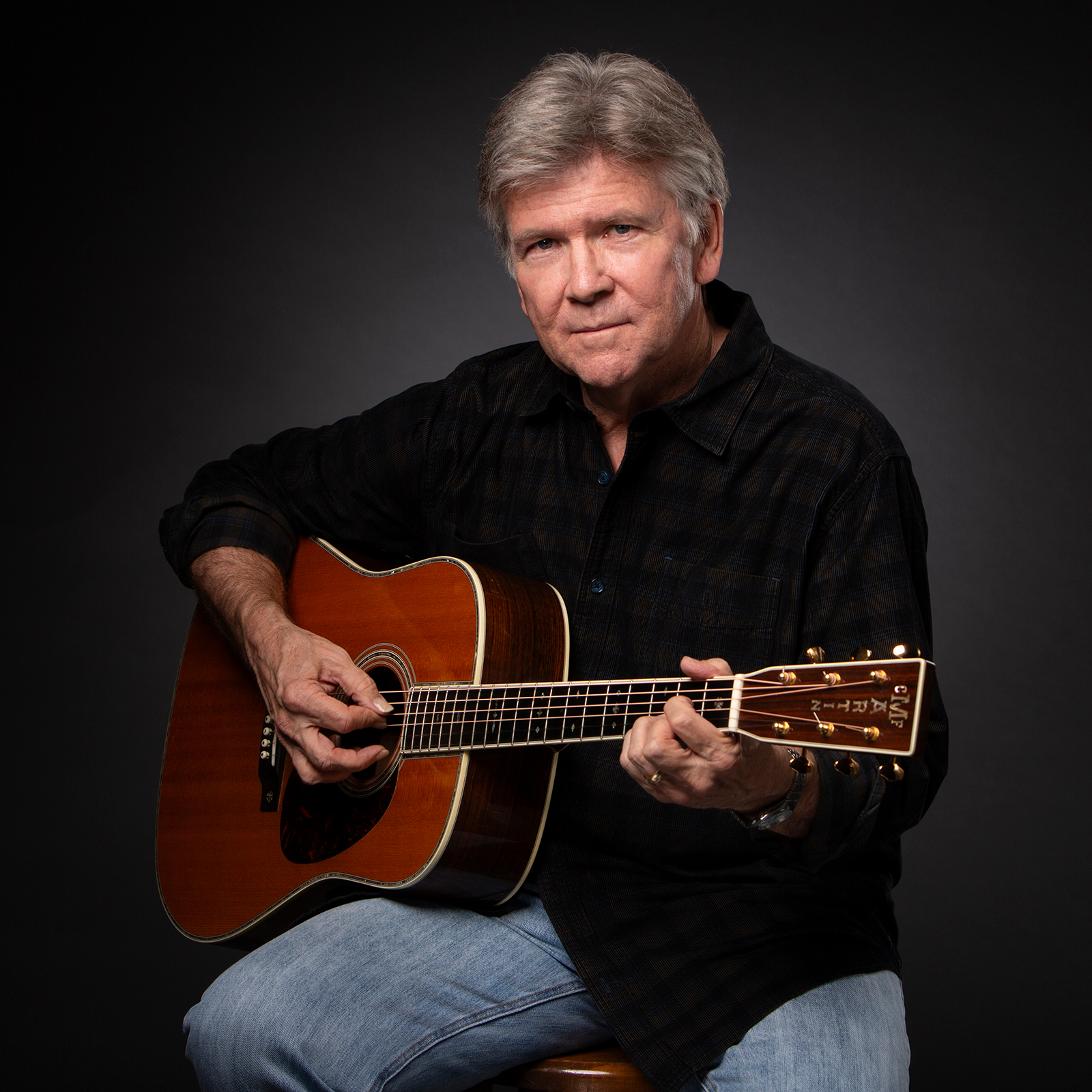 Musician portrait playing guitar