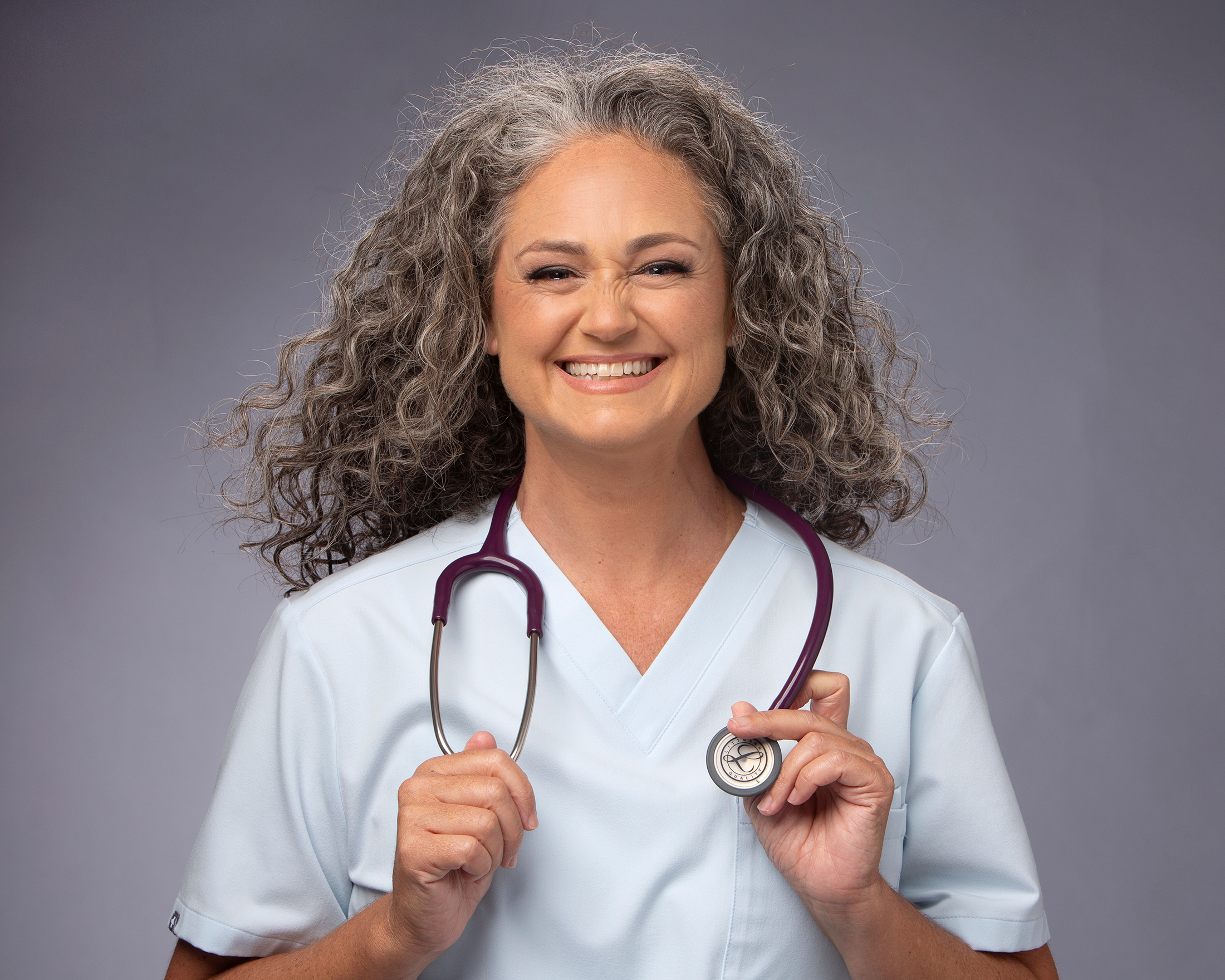 Headshot at Camera Creations Photography studio of Danika Frandsen owner of Baby Steps Concierge Nursing