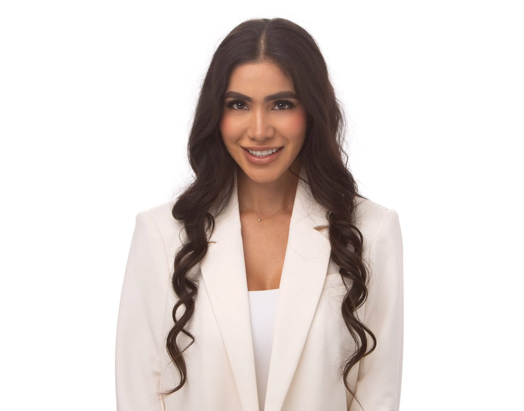 Headshot at the studio with a pure white backdrop.